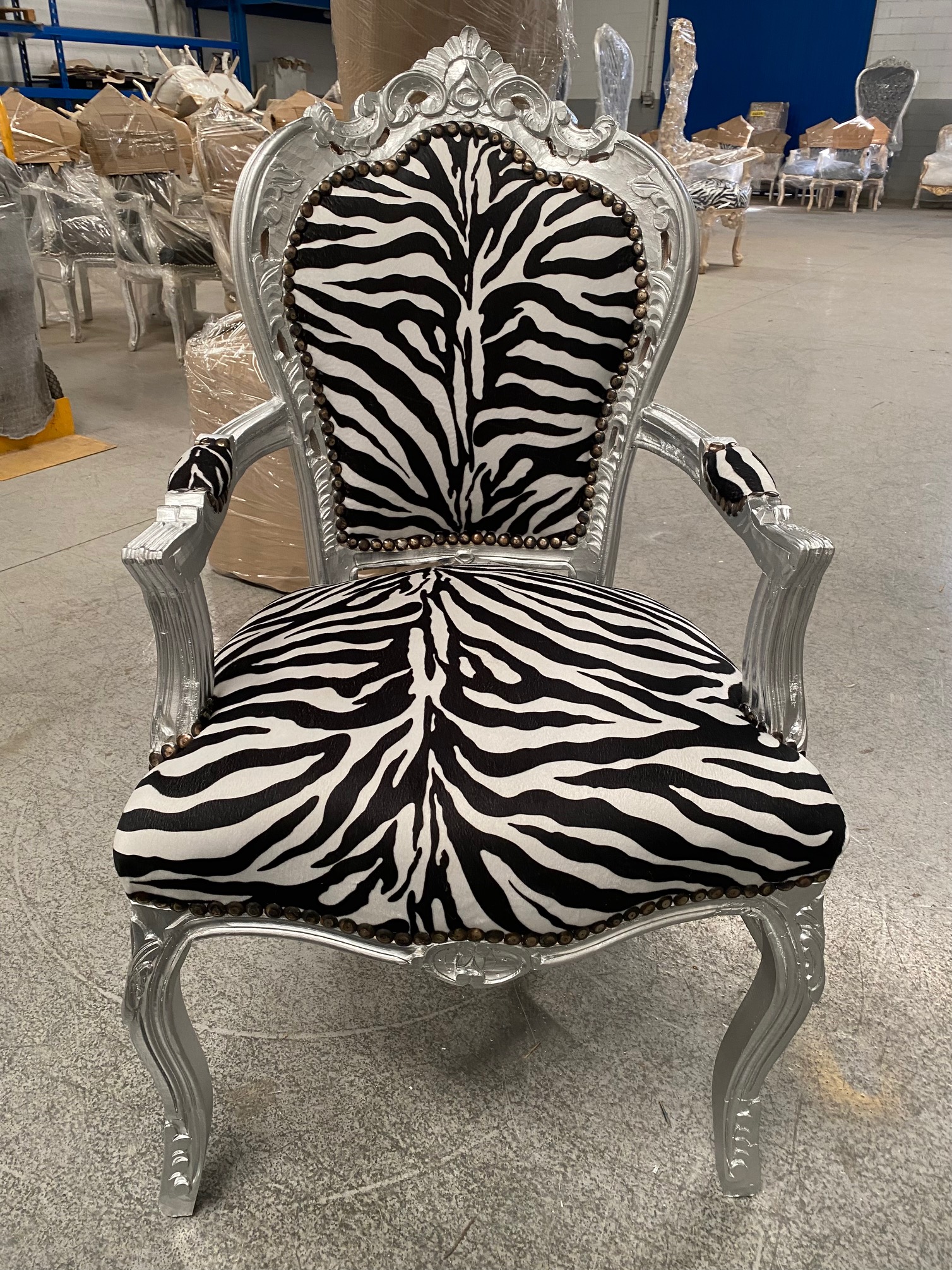 Silla con brazo plata/cebra